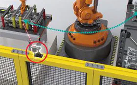 El LR-T montado lejos de la maquinaria gracias a su rango de 5 m, sobre una celda con robot